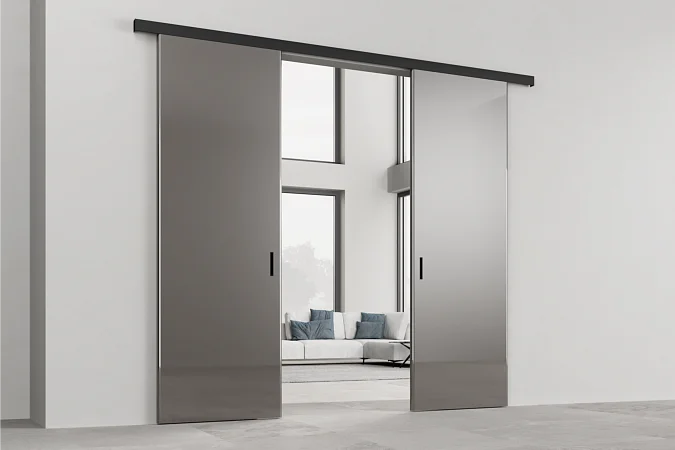 STRATUS-TONDA, модель Tirol, глянцевая эмаль LG15 Grafite Gloss, трек в чёрном цвете. Раздвижная перегородка по стене, видимый трек.