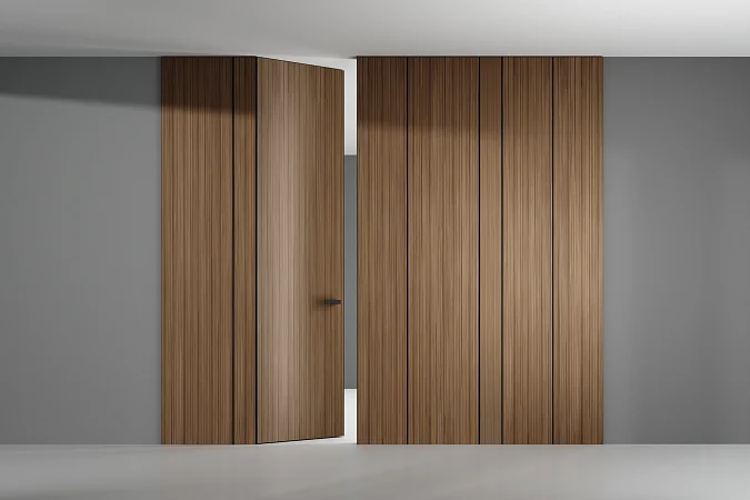 Стеновые панели COVER STOCK, натуральный шпон V16 Noce Canaletto, молдинги в отделке AL08 Black.