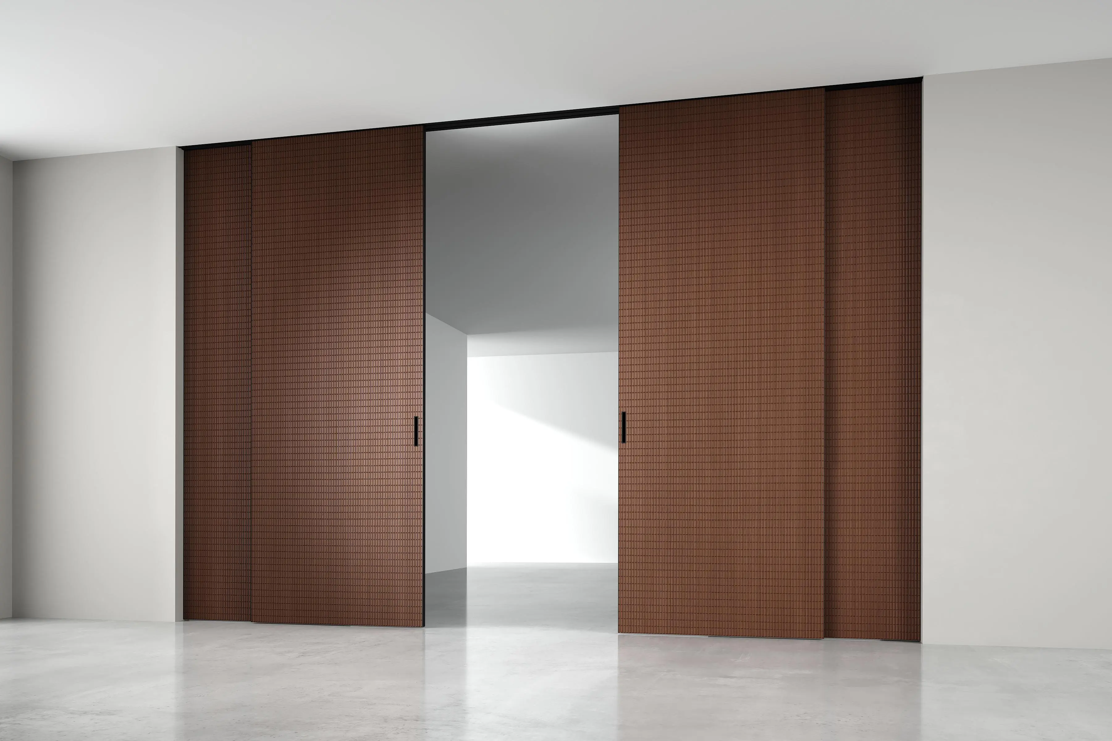 mini-STRATUS - UNFLEX-3D, Alu, модель Tartan, объемная 3D поверхность, натуральный шпон UT40 Noce Italiano. Алюминиевая торцевая кромка в отделке AL10 Black Matt, трек и ручка в отделке AL08 Black. Раздвижная перегородка в проёме, скрытый трек в потолке.