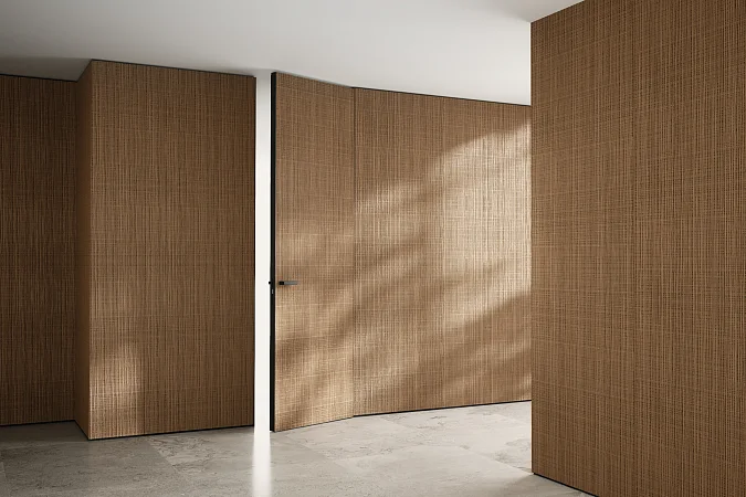 Стеновые панели COVER, UNIFLEX-3D, модель Canvas. Натуральный шпон UC40 Noce Italiano. Дверь UNIFLEX-3D, Alu, модель Canvas, алюминий в отделке AL10 Black Matt.