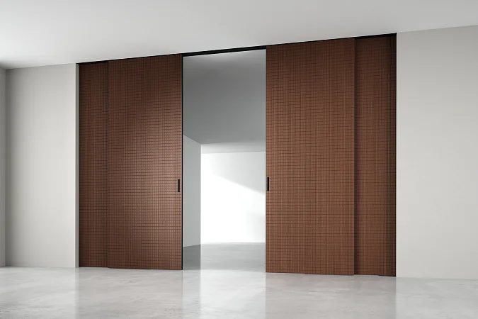 STRATUS - UNFLEX-3D, Alu, модель Tartan, объемная 3D поверхность, натуральный шпон  UT40 Noce Italiano. Алюминиевая торцевая кромка в отделке AL10 Black Matt, трек и ручка в отделке AL08 Black. Раздвижная перегородка в проёме, скрытый трек в потолке.